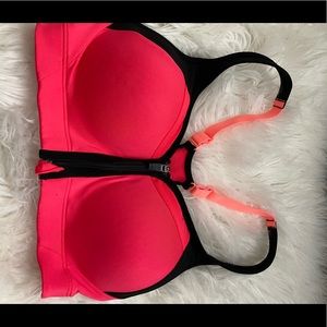 Pink front zip sports bra